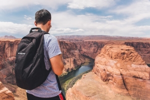 Man walking and enyoing view in Atlas mountains